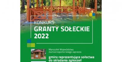 na zdjęciu widoczna jest drewniana altana z Napisem w ramce Granty sołeckie  2022