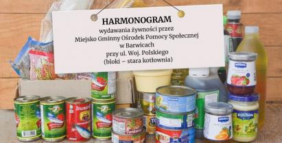 na zdjęciu żywność i tabliczka z napisem: HARMONOGRAM wydawania żywności przez  Miejsko Gminny Ośrodek Pomocy Społecznej  w Barwicach  przy ul. Woj. Polskiego  (bloki – stara kotłownia)